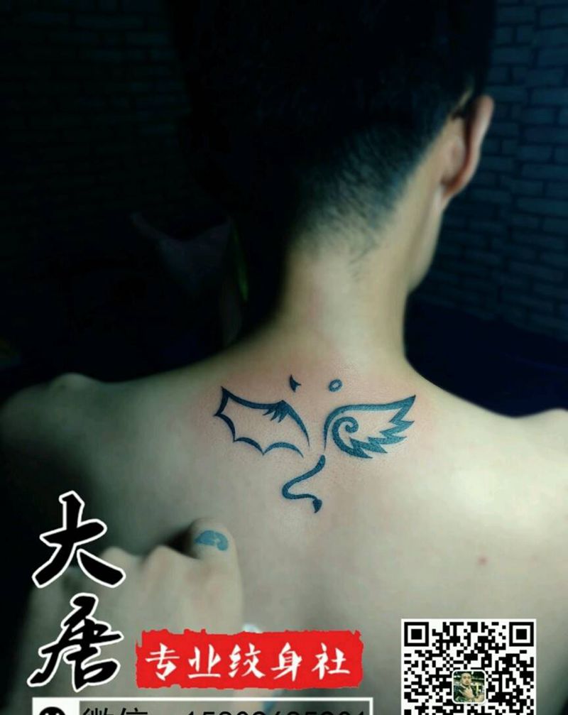 翅膀纹身图片_银川刺青大唐纹身图案