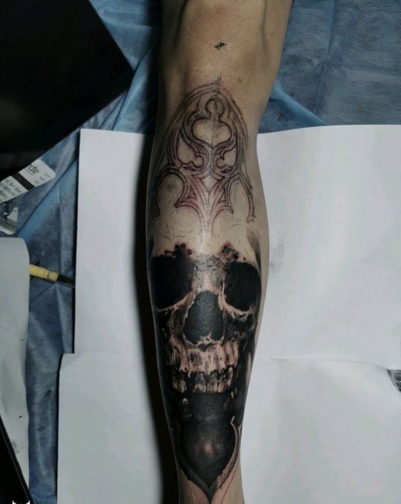 骷髅未完纹身图片_腿部欧美写实骷髅纹身图案
