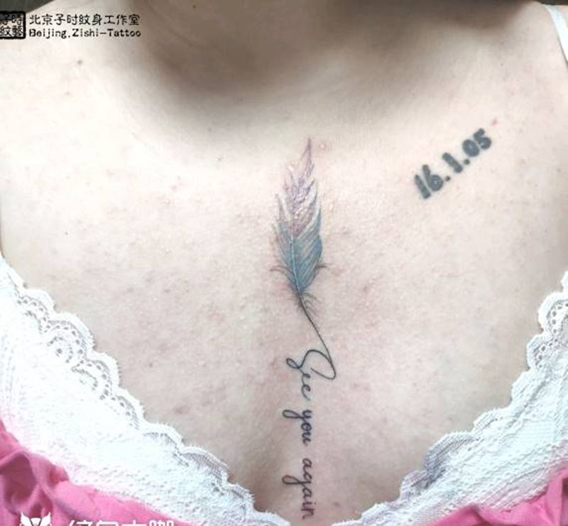 羽毛纹身图片_胸部纹身图案