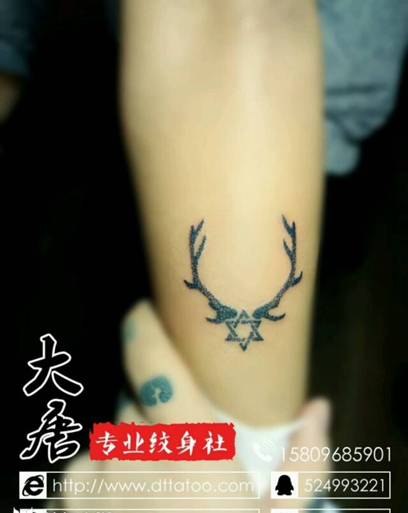 点刺纹身图片_银川大唐纹身图案