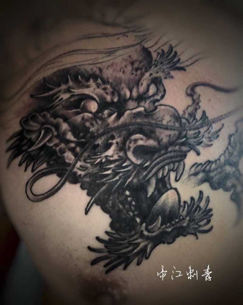 半甲龙未完纹身图片