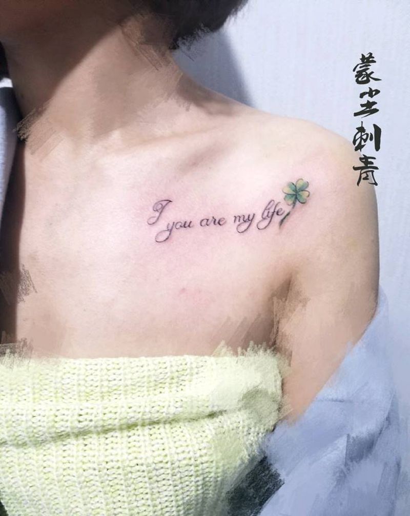 四叶草加字母纹身图片_胸部欧美字符植物成品纹身图案