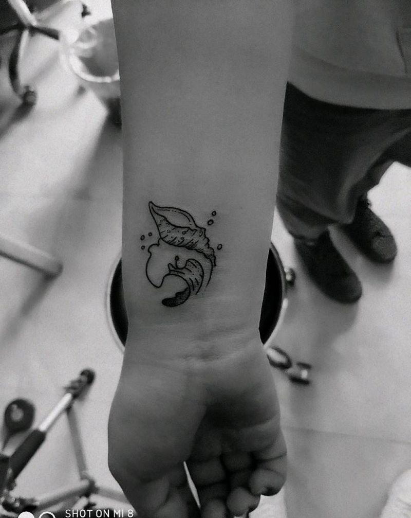 小海螺纹身图片