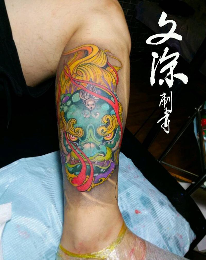 唐狮包小腿纹身图片_腿部传统动物纹身图案