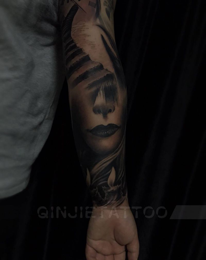 凝纹身图片_手臂欧美写实纹身图案