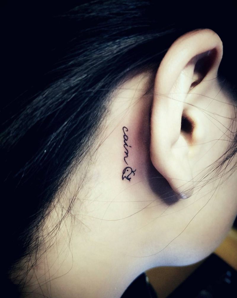 耳后字母小鲸鱼纹身图片