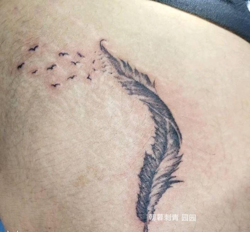 羽毛 兄弟纹身两种画风纹身图片