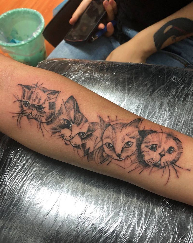 点刺猫纹身图片