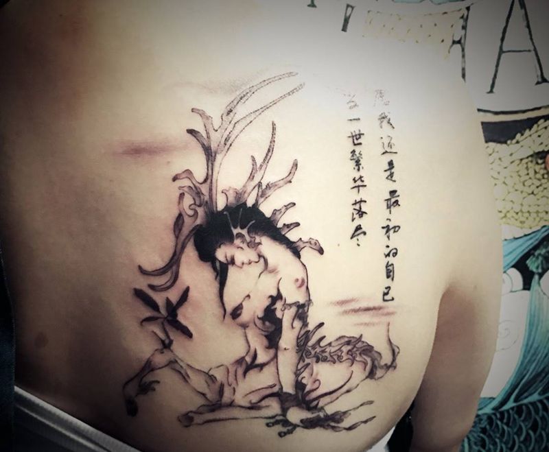 后背九龙之子纹身图片