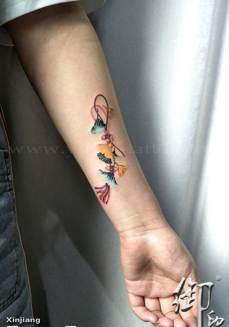 中国结纹身图片_手臂纹身图案