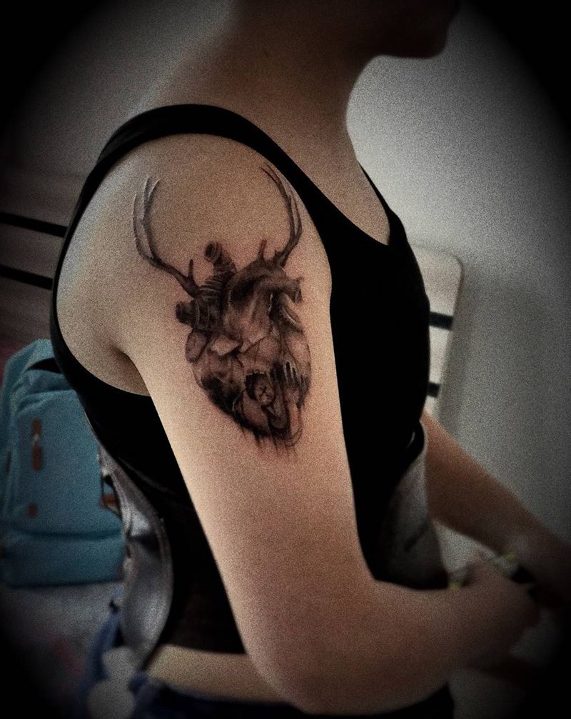 欧美写实心脏鹿角纹身图片