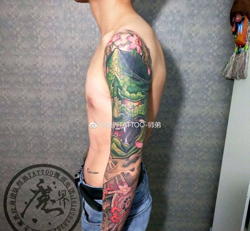 花臂（遮盖）纹身图片_手臂传统植物鬼神图腾原创成品纹身图案