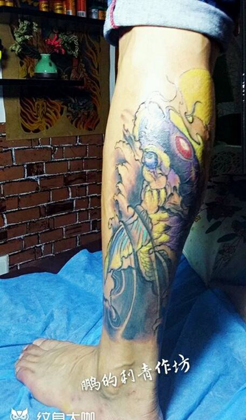 鲤鱼遮盖纹身图片