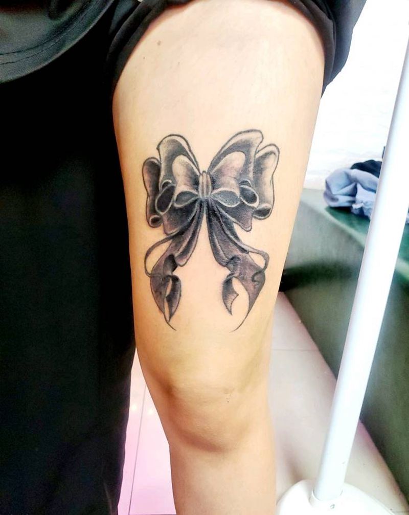 蝴蝶结纹身图片_腿部纹身图案