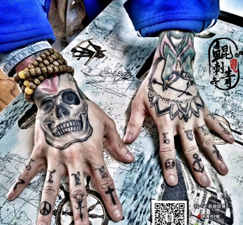 花手指纹身图片_手部花体字图腾纹身图案