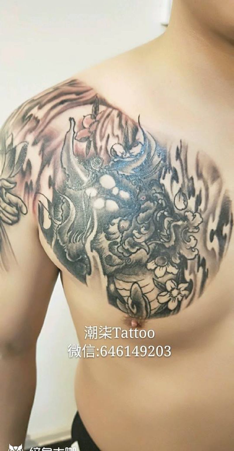 象神与唐狮半胛纹身图片