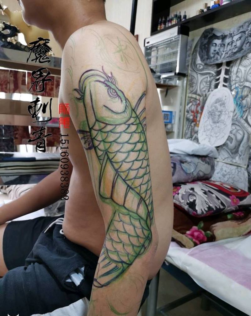日式老传统花臂纹身图片_手臂老传统日式鲤鱼花臂老传统纹身图案