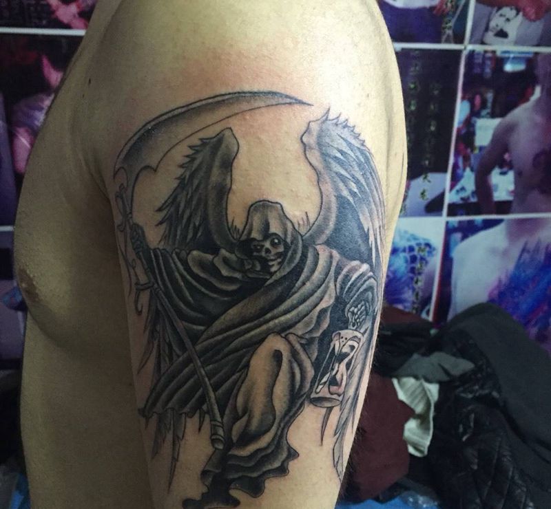 手臂死神纹身图片