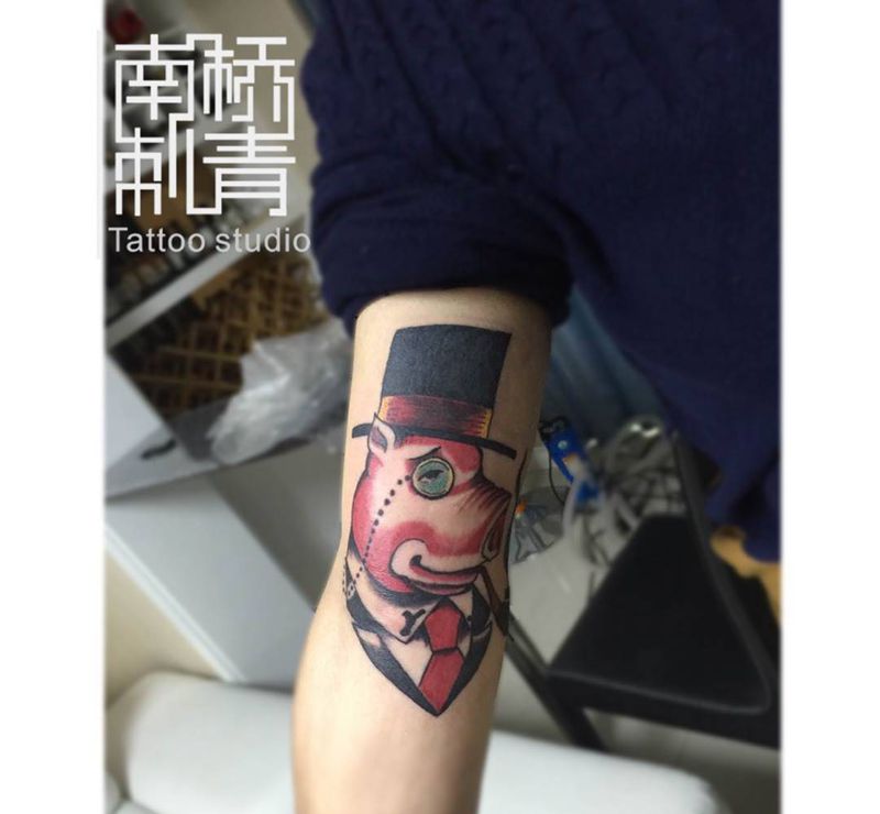 遮盖绅士猪纹身图片_成品手臂欧美纹身图案