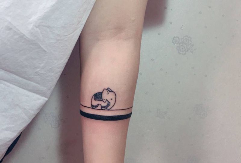 加线纹身图片_成品手臂传统清新动物纹身图案