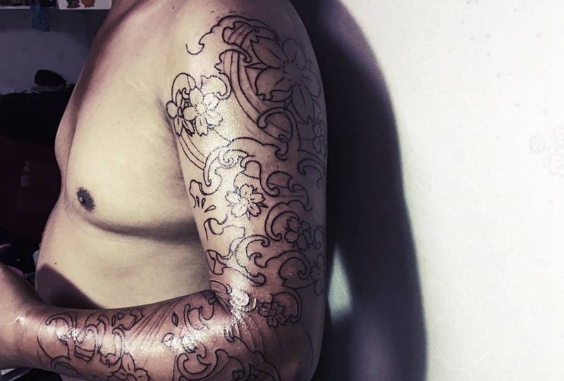 花臂纹身图片_传统手臂成品植物静物纹身图案