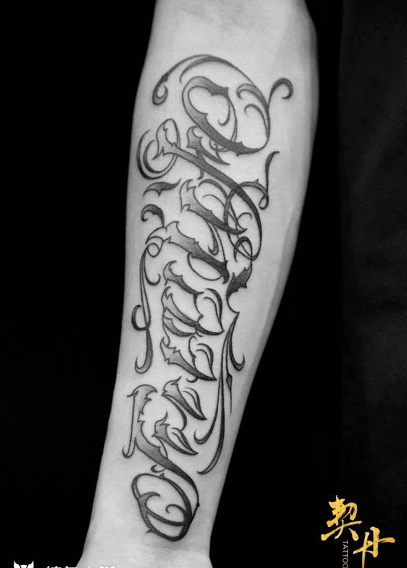 奇卡诺花体字纹身图片_手臂花体字纹身图案