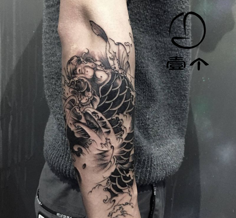 鱼纹身图片_手臂纹身图案