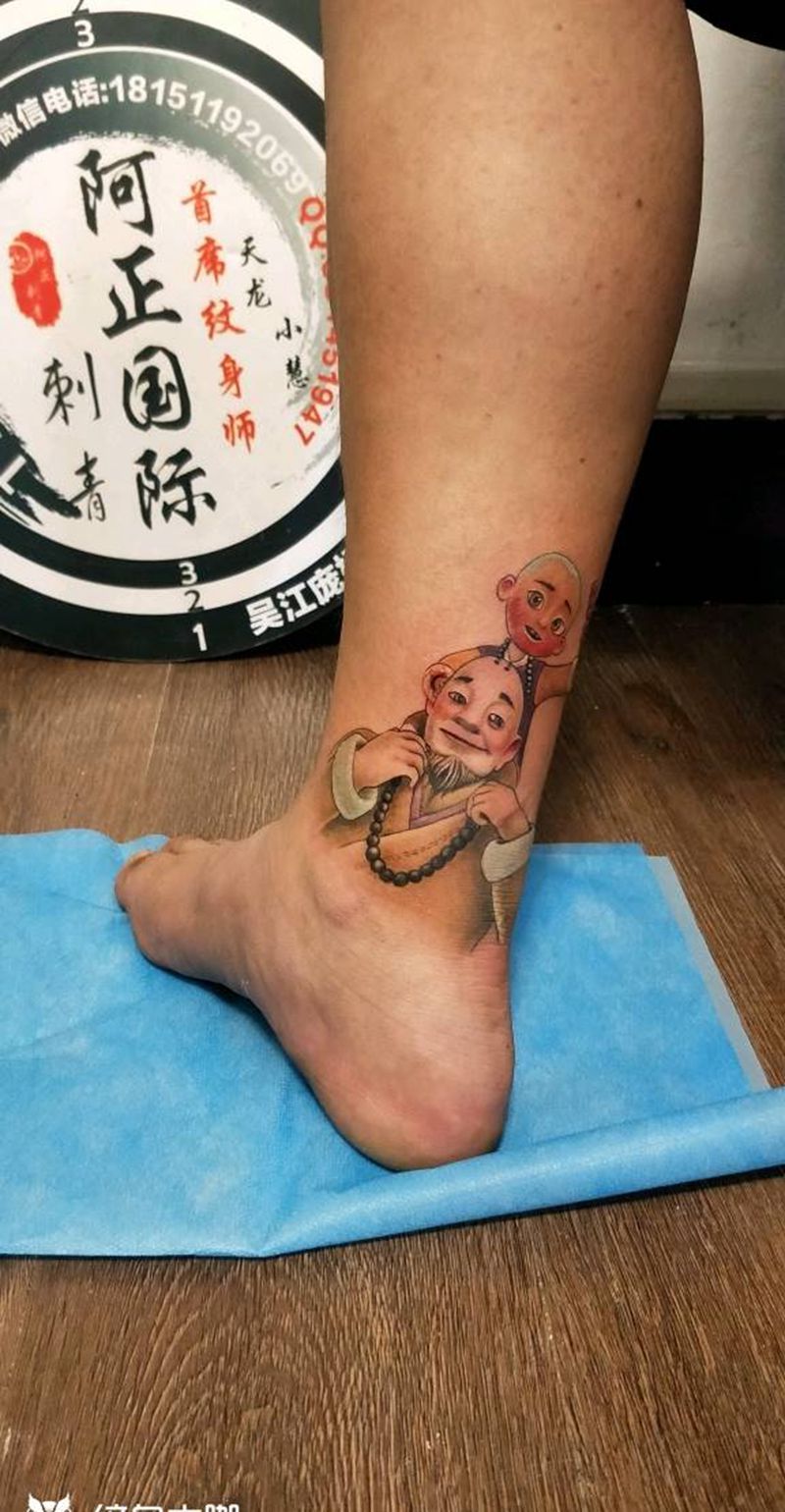 动画纹身图片_腿部纹身图案