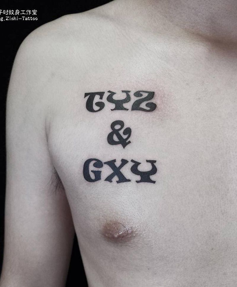 字母纹身图片_胸部纹身图案