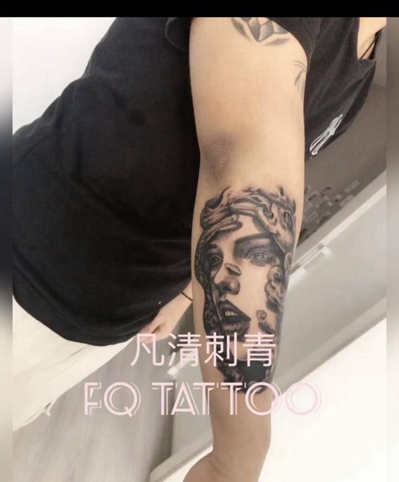 写实纹身图片_手臂纹身图案