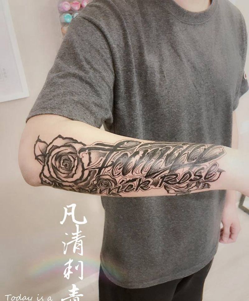 花体纹身图片_手臂花体字纹身图案