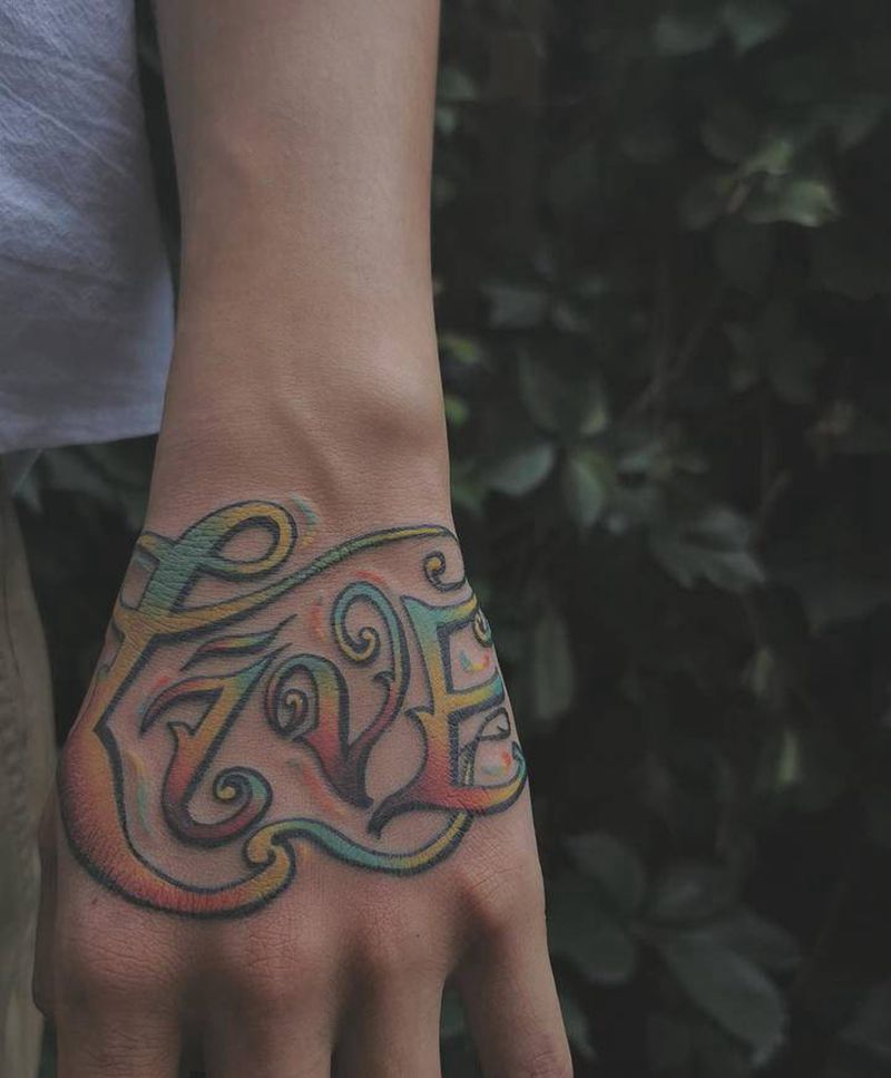 手背纹身图片_手部手臂花体字New School花体字手背彩色纹身图案