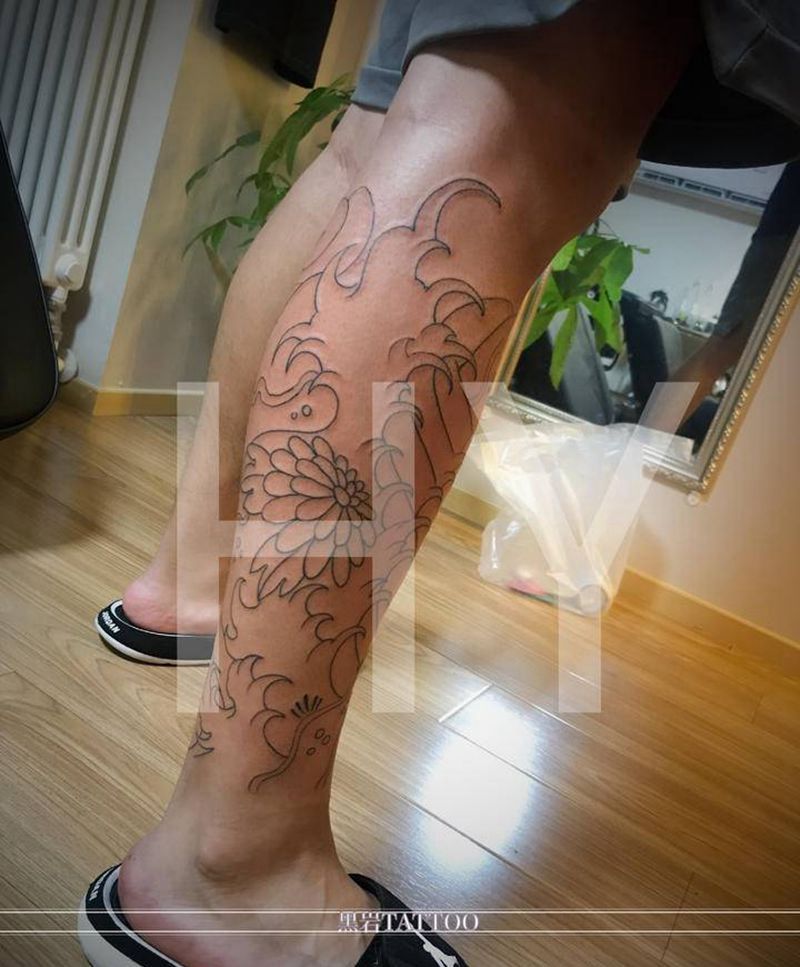 菊花浪腿纹身图片_腿部老传统纹身图案