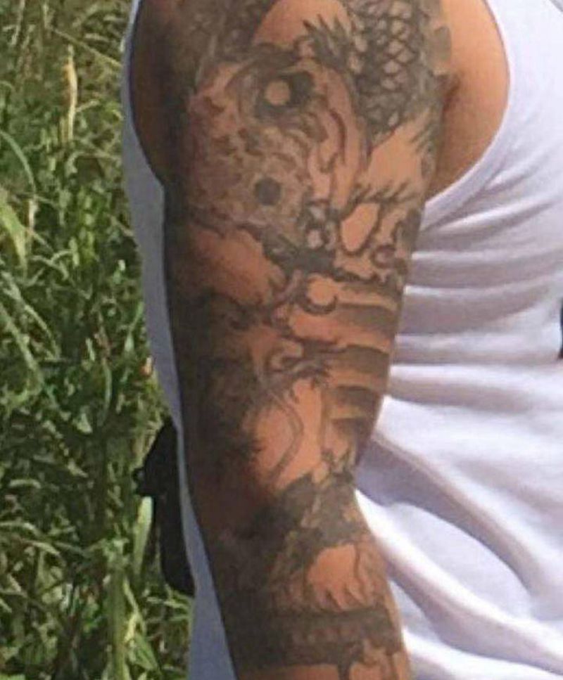 暴力遮盖纹身图片_手臂老传统纹身图案