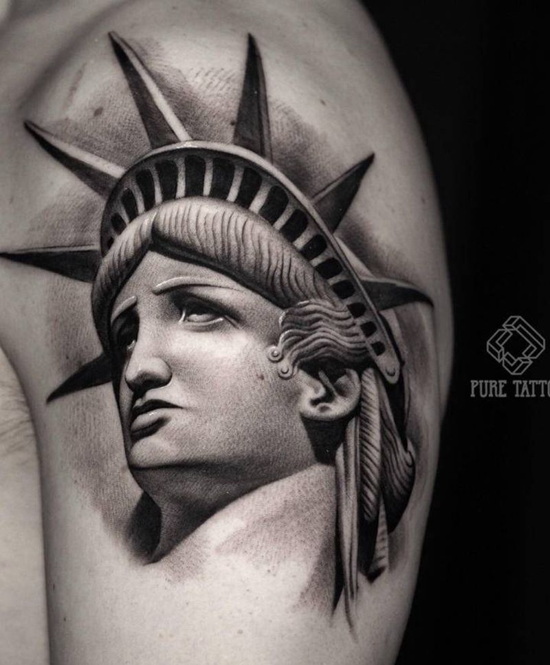 自由女神像纹身图片_手臂欧美写实自由女神纹身图案