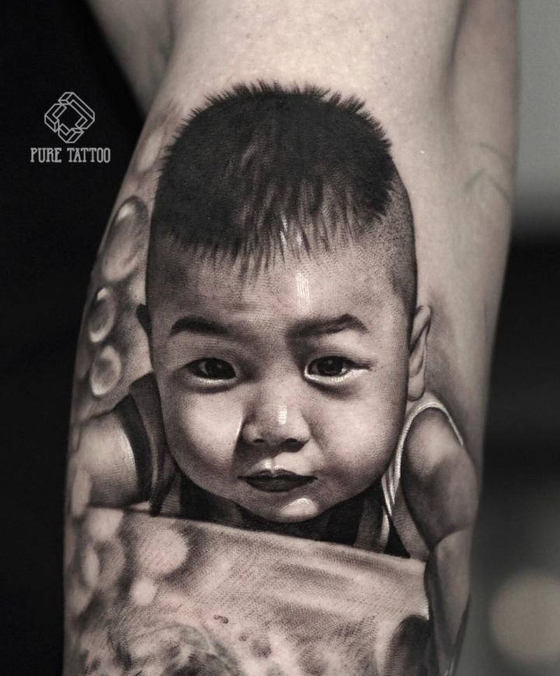 小孩子纹身图片_手臂欧美写实肖像纹身图案