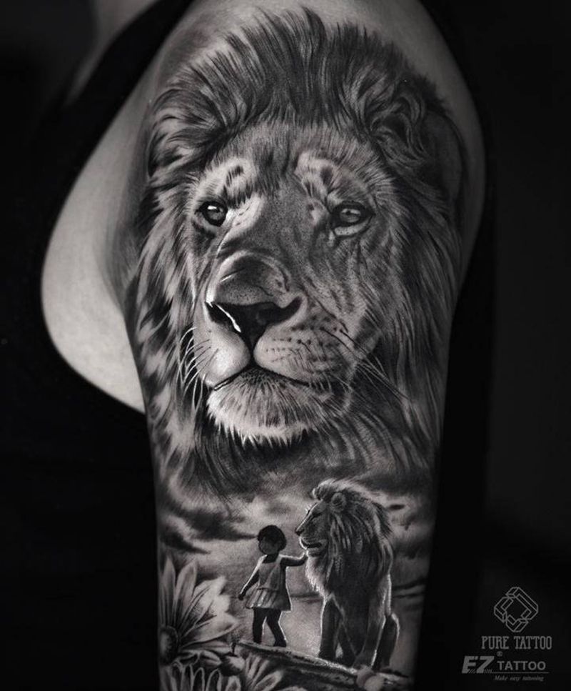 小狮子纹身图片_手臂欧美写实狮子父爱纹身图案