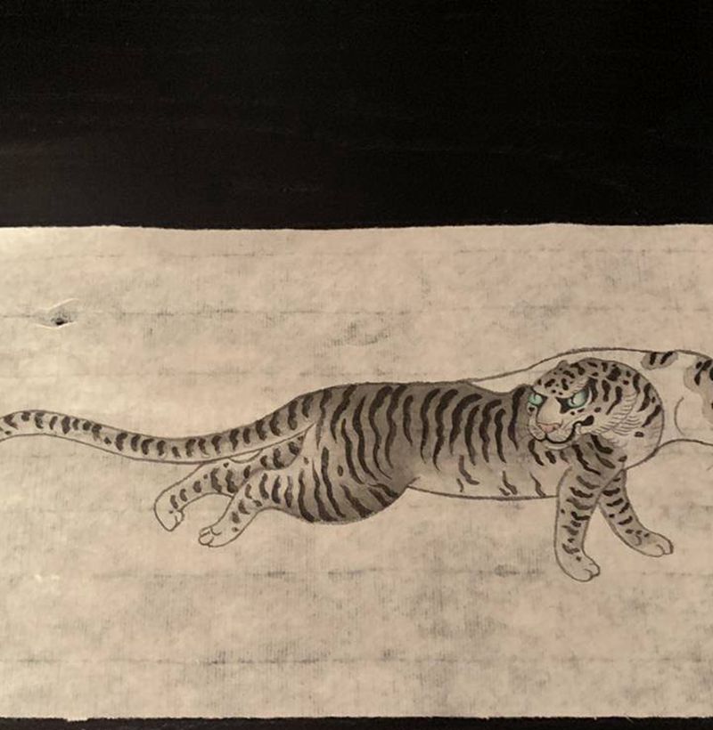 凶猛の两小只纹身图片_腿部手臂新传统猫龙虎纹身图案