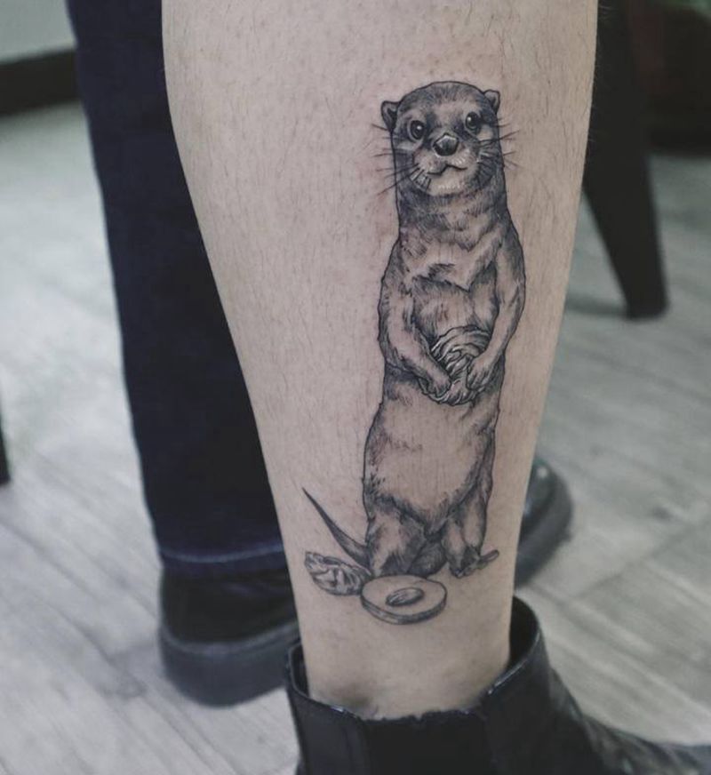 土拨鼠纹身图片_腿部写实纹身图案