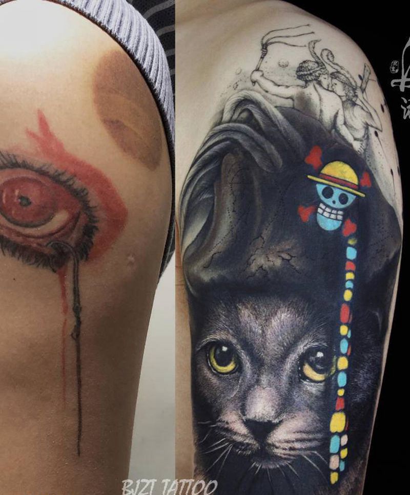 遮盖猫纹身图片_手臂欧美写实猫纹身图案