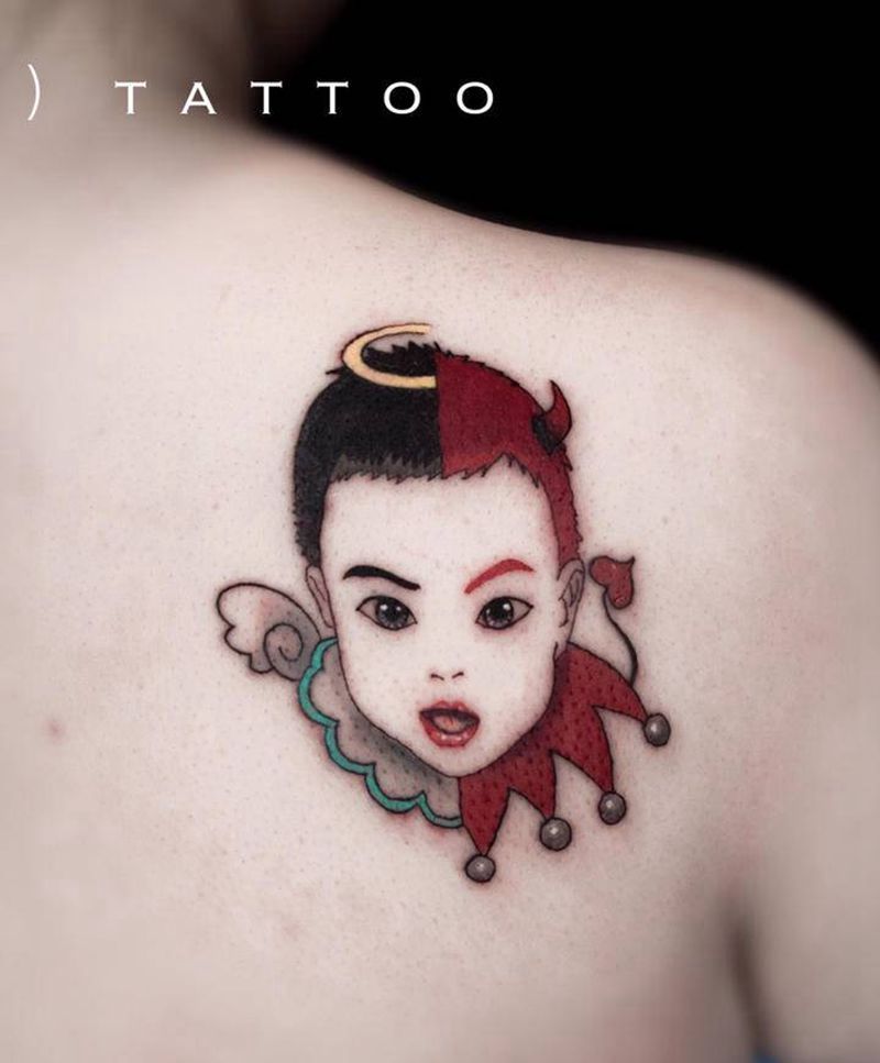 肖像纹身图片_手臂背部New School肖像天使恶魔人物纹身图案