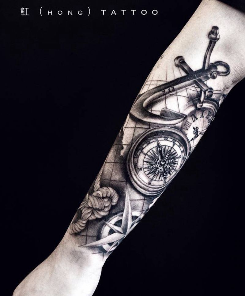 航海主题纹身图片_手臂欧美写实指南针船锚航海地图舵盘麻绳纹身图案