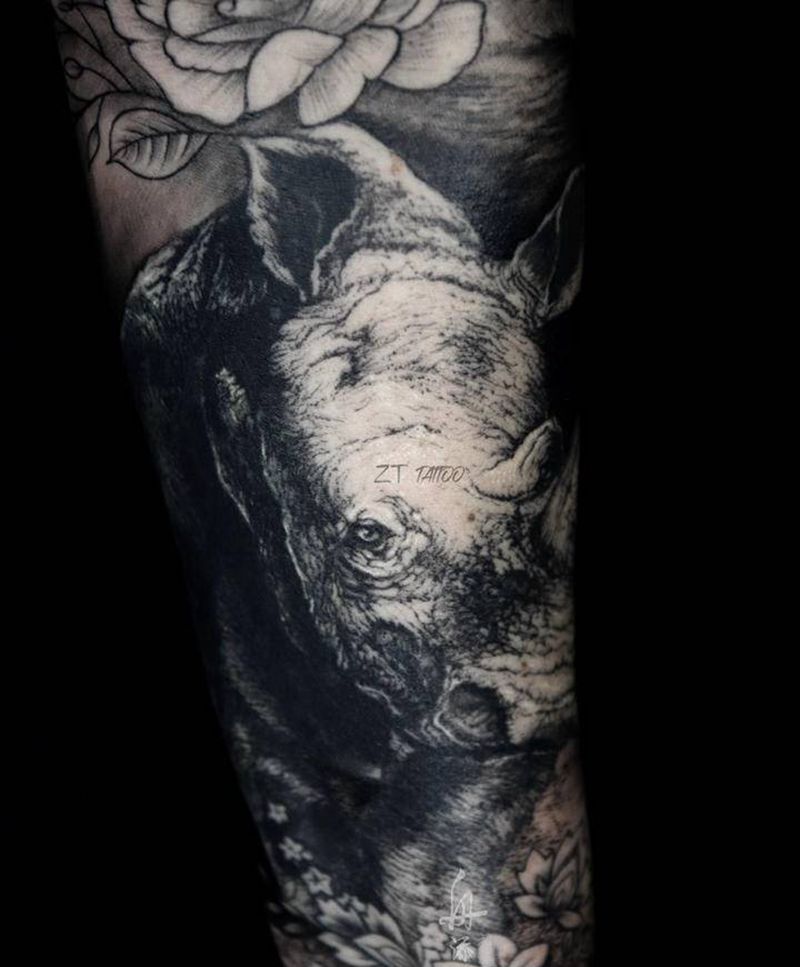 非洲动物纹身图片_手臂欧美写实犀牛狮子大象纹身图案