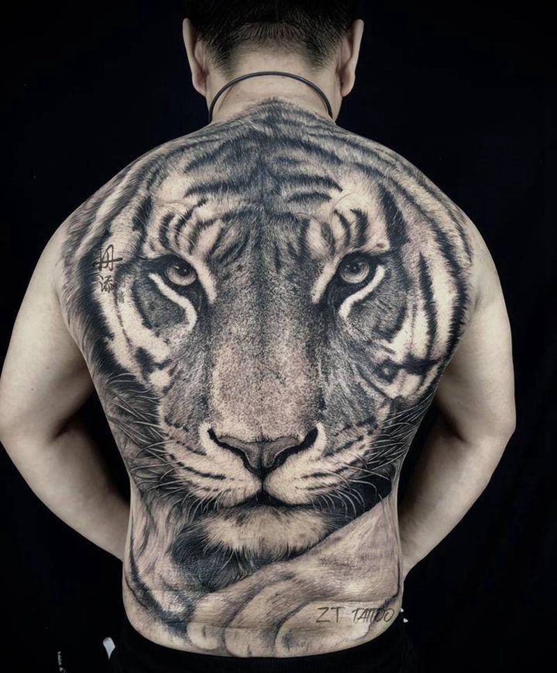 不怒自威之一世富足纹身图片_背部欧美写实虎满背虎纹身图案