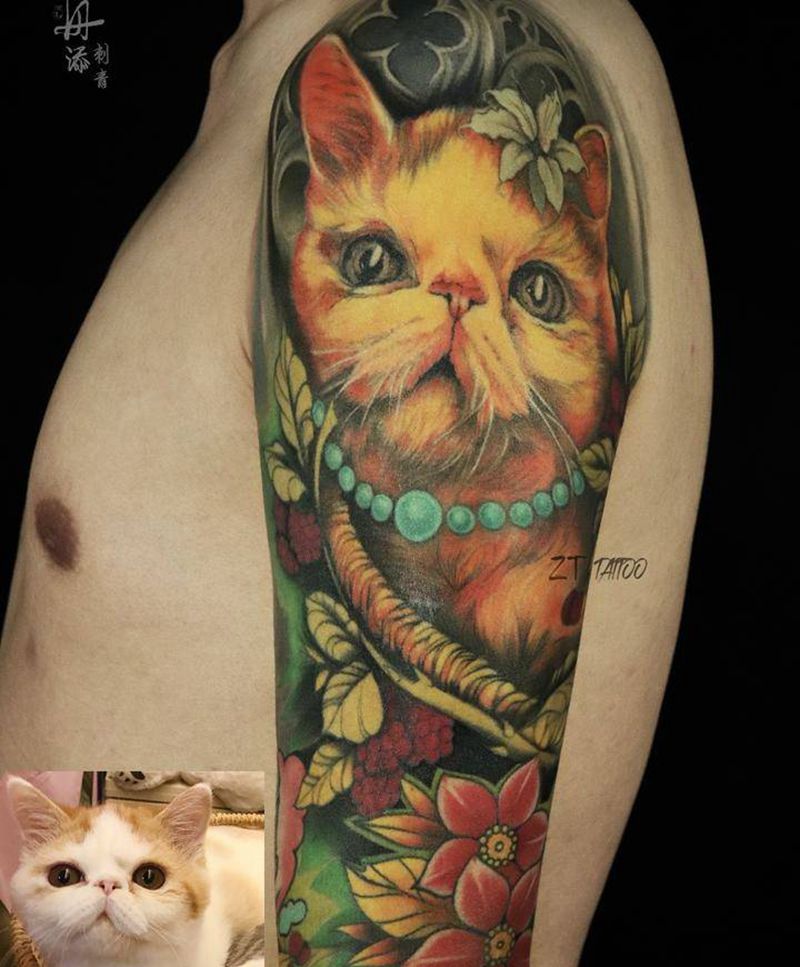 加菲猫纹身图片_手臂New School欧美写实卡通写实猫彩色花臂纹身图案