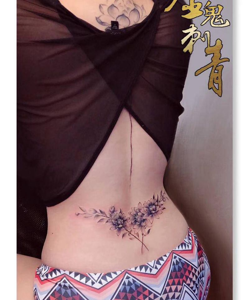 花纹身图片_腰部纹身图案