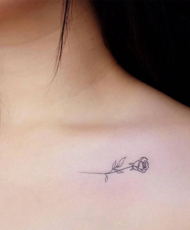 玫瑰纹身图片_胸部New School线条纹身玫瑰纹身图案