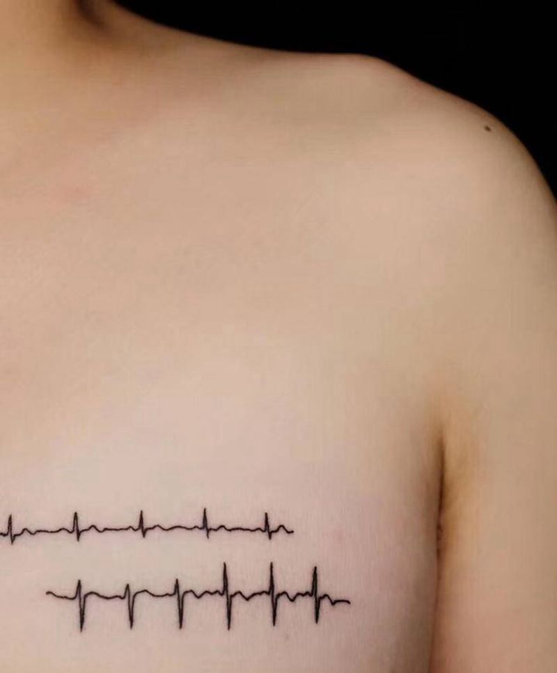 心电图纹身图片_胸部几何心电图 线条纹身图案