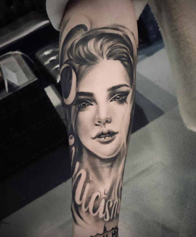 美女纹身图片_手臂纹身图案