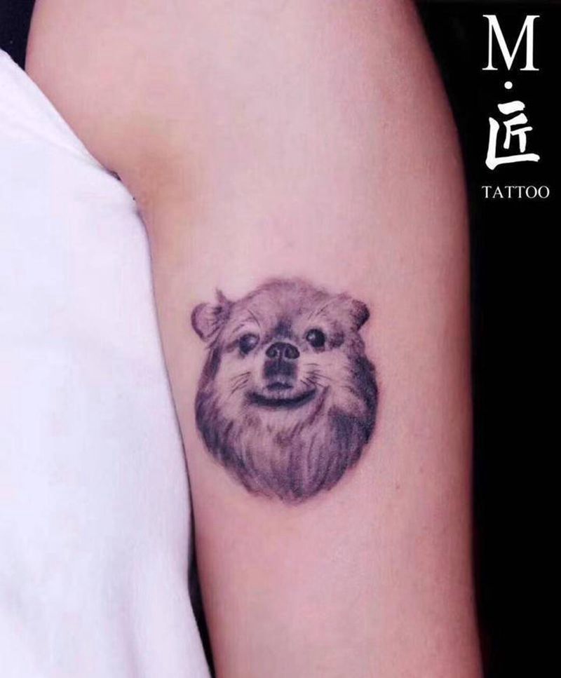 宠物狗纹身图片_手臂欧美写实宠物狗纹身图案